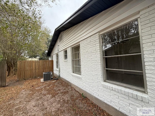 view of home's exterior with central AC