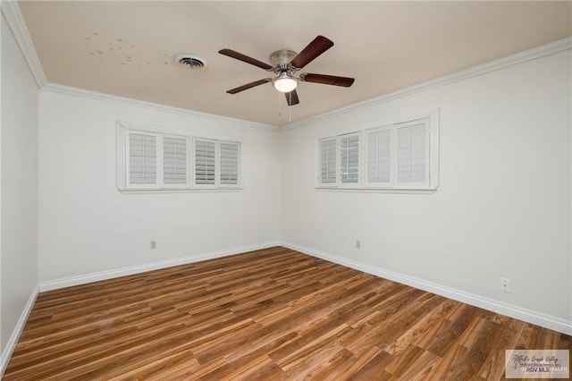 1500 Bryan Rd, Mission, TX 78572 - spare room featuring wood finished floors, crown molding, and a ceiling fan