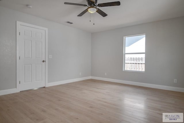 unfurnished room featuring ceiling fan and light hardwood / wood-style floors