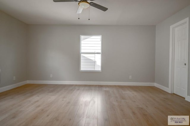 spare room with ceiling fan and light hardwood / wood-style flooring