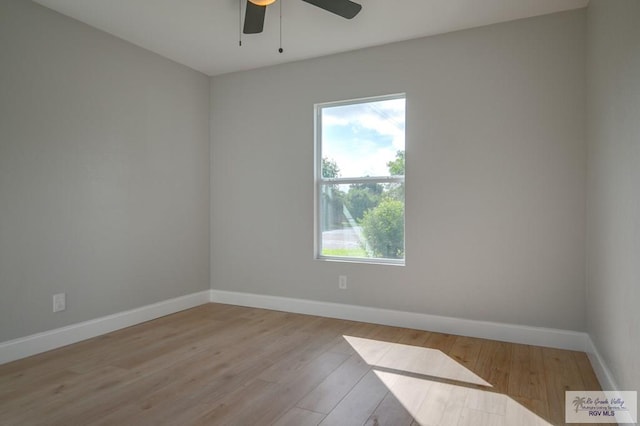 spare room featuring ceiling fan and light hardwood / wood-style flooring