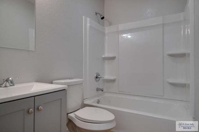 full bathroom featuring vanity, shower / bathtub combination, and toilet