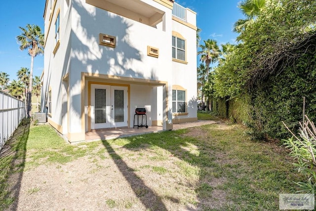 6401 Fountain Way S, Padre Island, TX 78597 - rear view of property with a patio area, french doors, and stucco siding