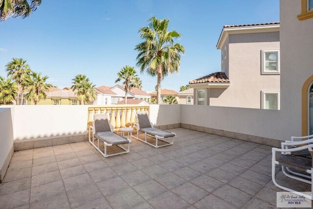 6401 Fountain Way S, Padre Island, TX 78597 - view of patio / terrace featuring a residential view