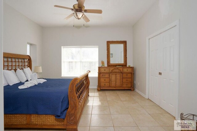 6401 Fountain Way S, Padre Island, TX 78597 - bedroom featuring light tile patterned floors and a ceiling fan