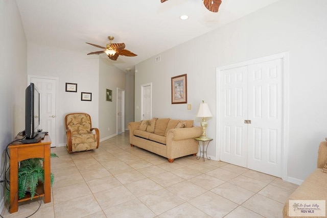 6401 Fountain Way S, Padre Island, TX 78597 - living area with ceiling fan, light tile patterned floors, and lofted ceiling