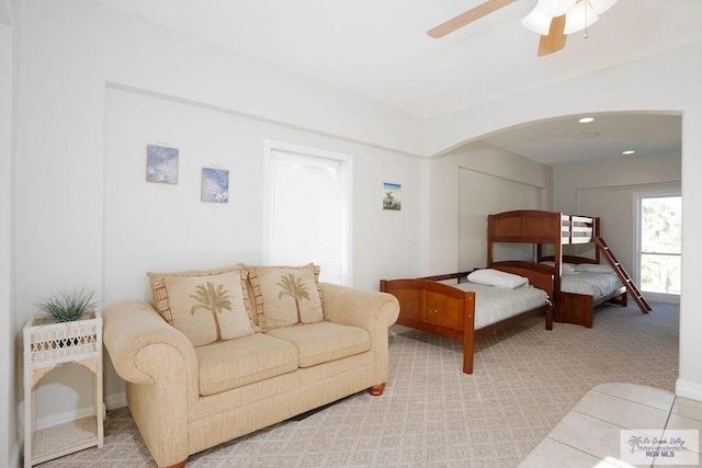 6401 Fountain Way S, Padre Island, TX 78597 - carpeted bedroom featuring arched walkways and ceiling fan