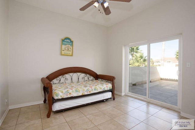 6401 Fountain Way S, Padre Island, TX 78597 - bedroom with access to outside, light tile patterned flooring, and ceiling fan