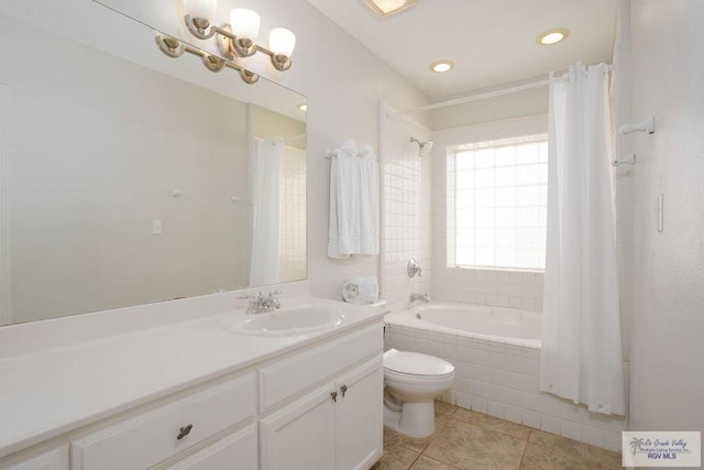 6401 Fountain Way S, Padre Island, TX 78597 - bathroom with tiled shower / bath, vanity, and tile patterned floors