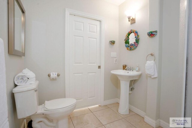 6401 Fountain Way S, Padre Island, TX 78597 - bathroom with toilet and tile patterned floors
