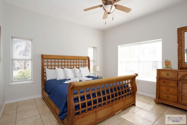 6401 Fountain Way S, Padre Island, TX 78597 - bedroom with multiple windows, light tile patterned floors, and ceiling fan