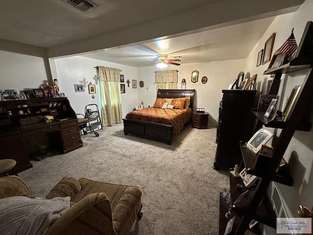 bedroom featuring ceiling fan and light colored carpet