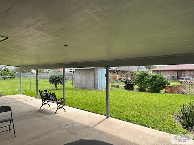 view of patio / terrace with a shed