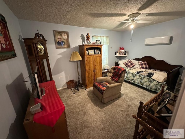 bedroom featuring ceiling fan, a wall mounted AC, a textured ceiling, and carpet floors