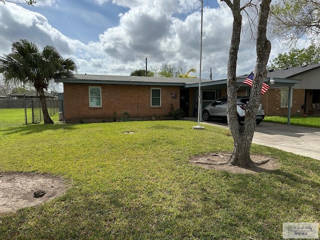 ranch-style house featuring a carport and a front yard