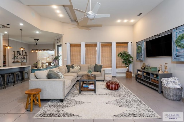 living area featuring ceiling fan, recessed lighting, light tile patterned floors, and visible vents