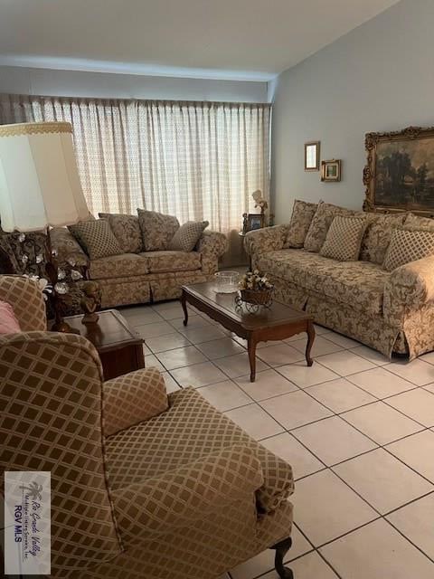 living room featuring light tile patterned floors