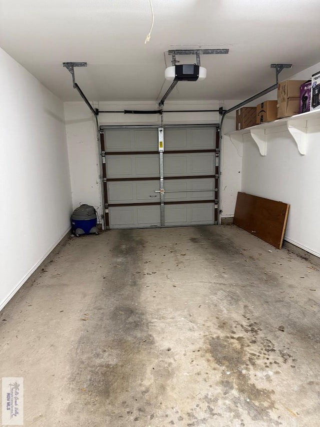 garage featuring a garage door opener