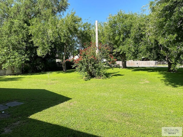 view of yard with fence
