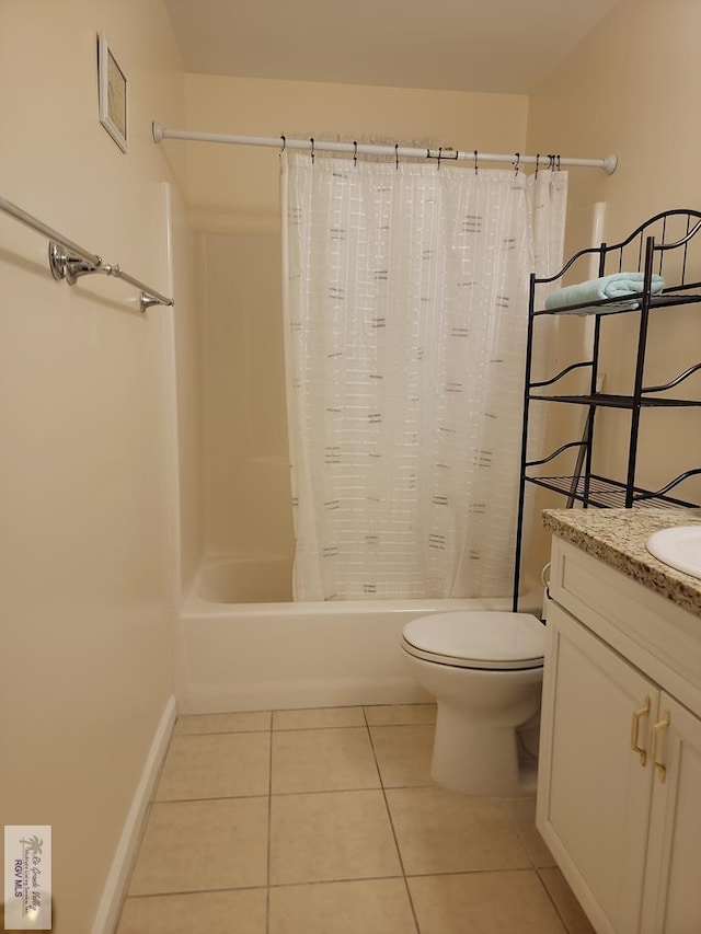 180 Chippewa Cir, Harlingen, TX 78555 - full bathroom with tile patterned flooring, shower / bathtub combination with curtain, toilet, vanity, and baseboards