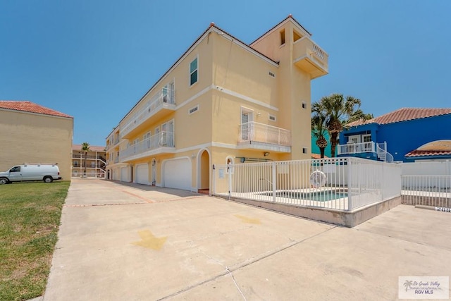 view of building exterior with a garage