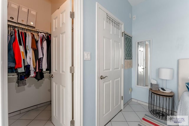 interior space featuring light tile patterned flooring