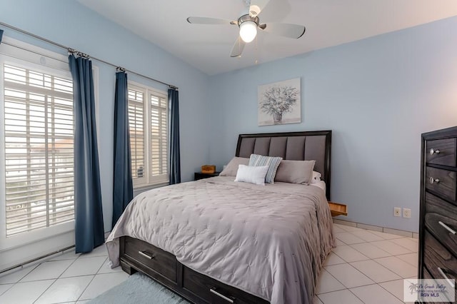 bedroom with light tile patterned floors and ceiling fan