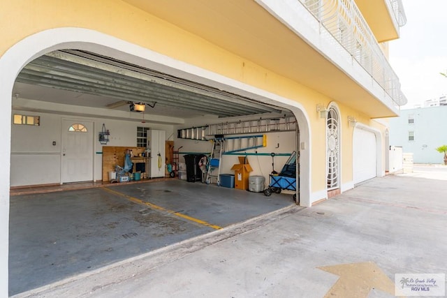 garage featuring a garage door opener