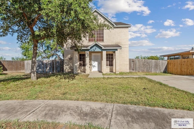 view of front of home featuring a front yard