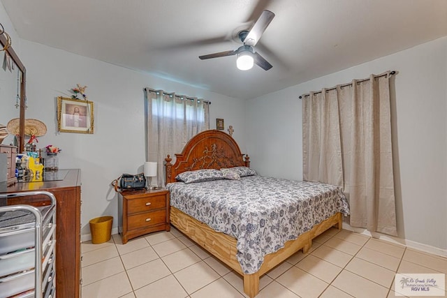 24 Ivy Ln, Brownsville, TX 78521 - bedroom featuring light tile patterned floors and a ceiling fan