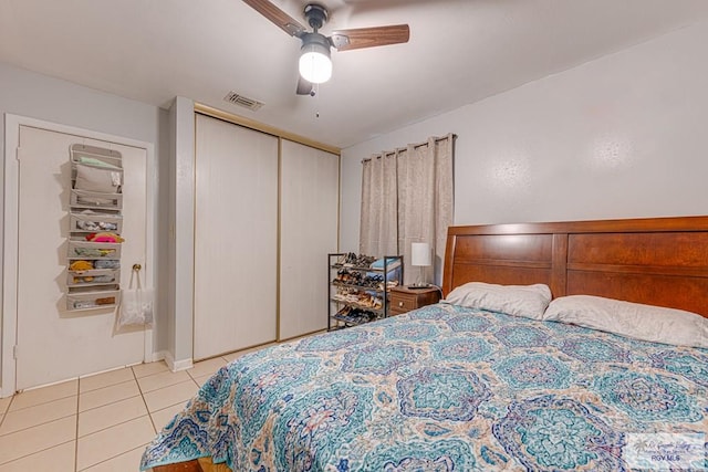 24 Ivy Ln, Brownsville, TX 78521 - bedroom with tile patterned floors, a closet, and a ceiling fan