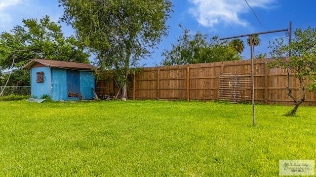 24 Ivy Ln, Brownsville, TX 78521 - fenced backyard featuring a storage shed