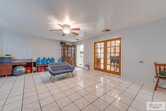 24 Ivy Ln, Brownsville, TX 78521 - living area featuring french doors, ceiling fan, and light tile patterned floors