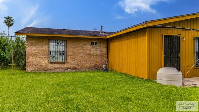 24 Ivy Ln, Brownsville, TX 78521 - view of home's exterior featuring a yard