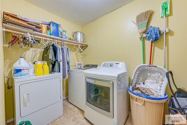 24 Ivy Ln, Brownsville, TX 78521 - laundry room with independent washer and dryer and light tile patterned floors