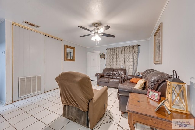 24 Ivy Ln, Brownsville, TX 78521 - living area with a ceiling fan, light tile patterned floors, and crown molding