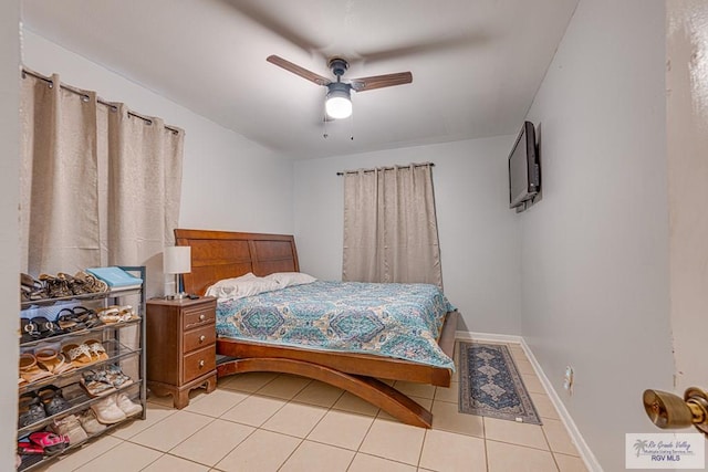 24 Ivy Ln, Brownsville, TX 78521 - bedroom with light tile patterned floors and a ceiling fan