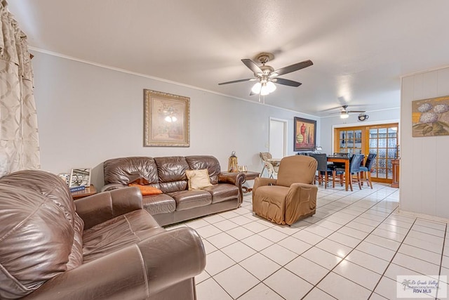 24 Ivy Ln, Brownsville, TX 78521 - living room featuring light tile patterned flooring, a ceiling fan, and crown molding