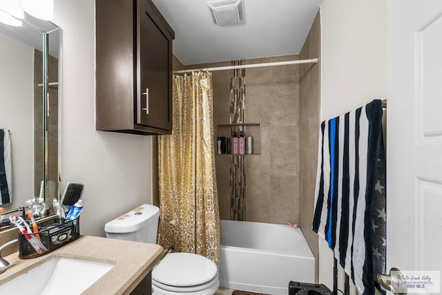 full bath with shower / bath combo, visible vents, vanity, and toilet