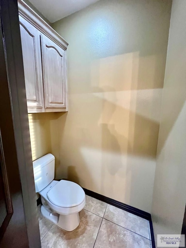 27281 Palm Blvd, Harlingen, TX 78552 - bathroom with toilet and tile patterned floors