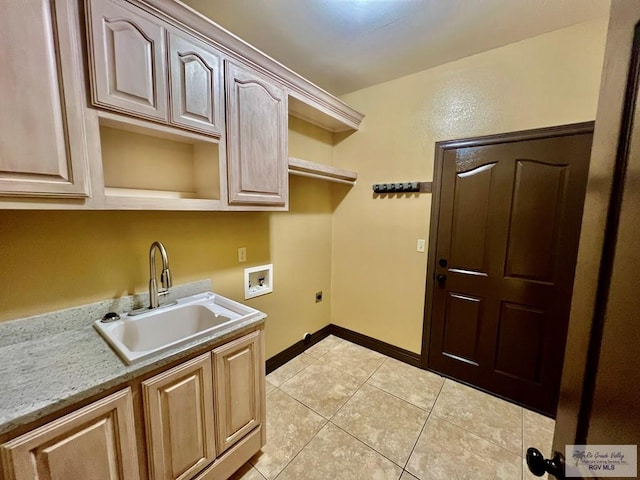 27281 Palm Blvd, Harlingen, TX 78552 - laundry area featuring hookup for an electric dryer, cabinet space, hookup for a washing machine, and light tile patterned flooring