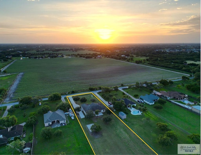 27281 Palm Blvd, Harlingen, TX 78552 - aerial view at dusk of a view of countryside, agricultural plots, property parcel outlined, and a residential view