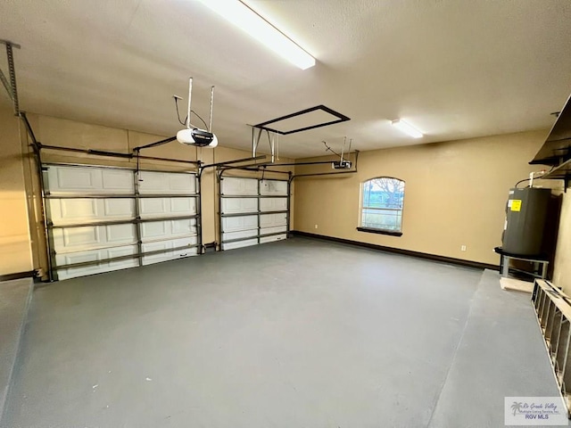 27281 Palm Blvd, Harlingen, TX 78552 - garage featuring a garage door opener and water heater