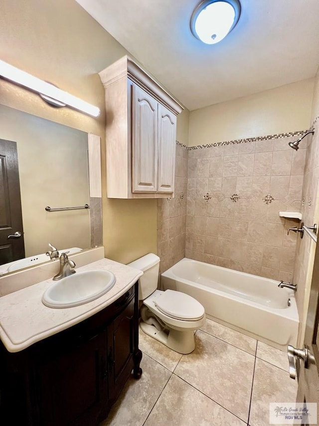 27281 Palm Blvd, Harlingen, TX 78552 - bathroom featuring tile patterned floors, vanity, and washtub / shower combination