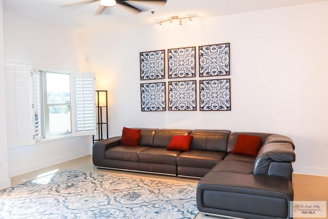 living room featuring ceiling fan