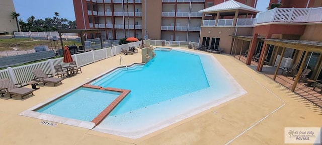 view of pool with a patio