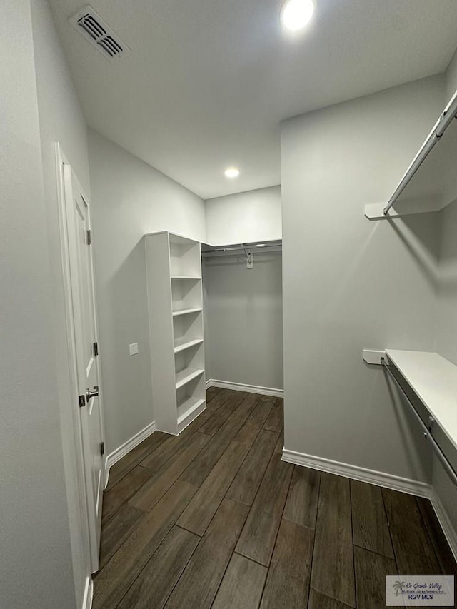 2299 Athens St, Brownsville, TX 78520 - spacious closet featuring dark wood-style floors