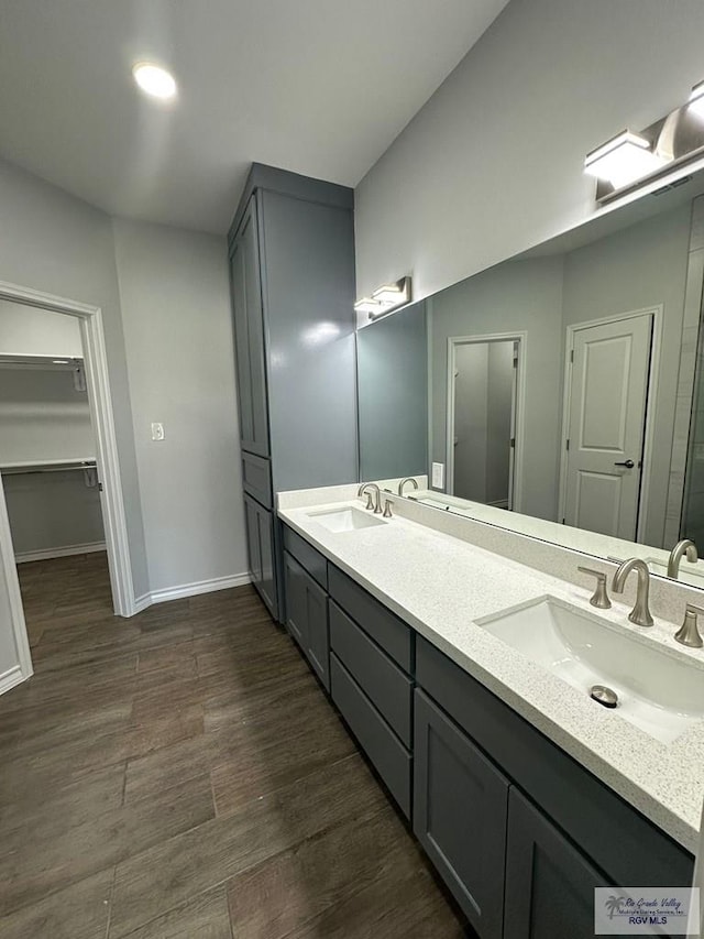 2299 Athens St, Brownsville, TX 78520 - full bath with double vanity and wood finished floors
