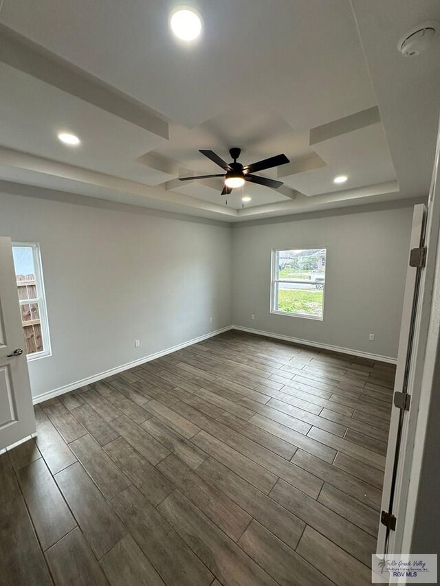 2299 Athens St, Brownsville, TX 78520 - spare room featuring a raised ceiling, a ceiling fan, dark wood finished floors, a smoke detector, and recessed lighting