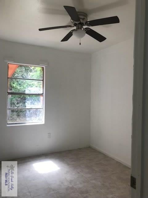 empty room with ceiling fan